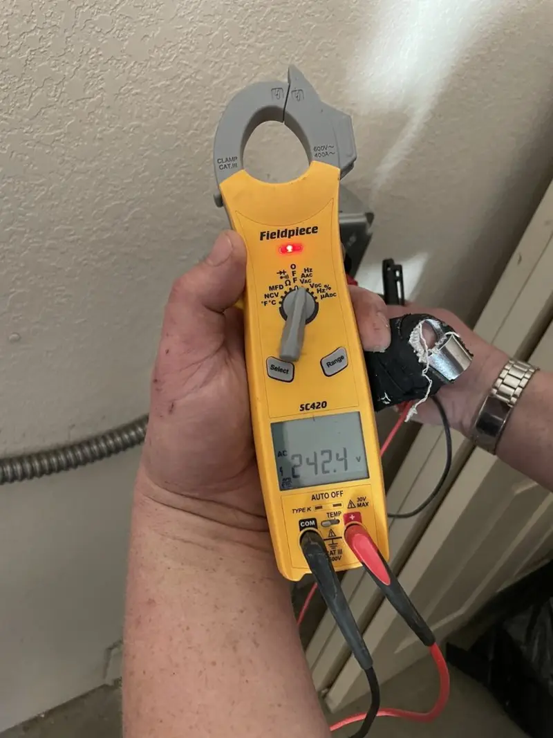 Voltage testing with clamp meter during Circuit Breaker Repair in Bellefontaine
